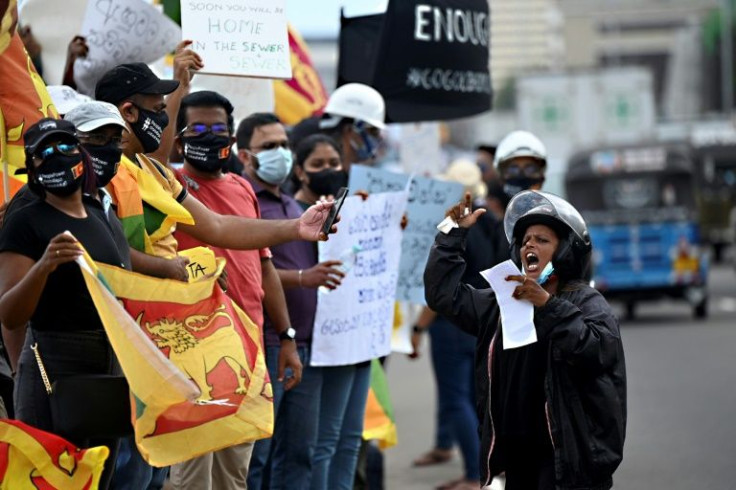 Tens of thousands marched on beleaguered Sri Lankan President Gotabaya Rajapaksa's office to protest the country's dire economic and political crisis