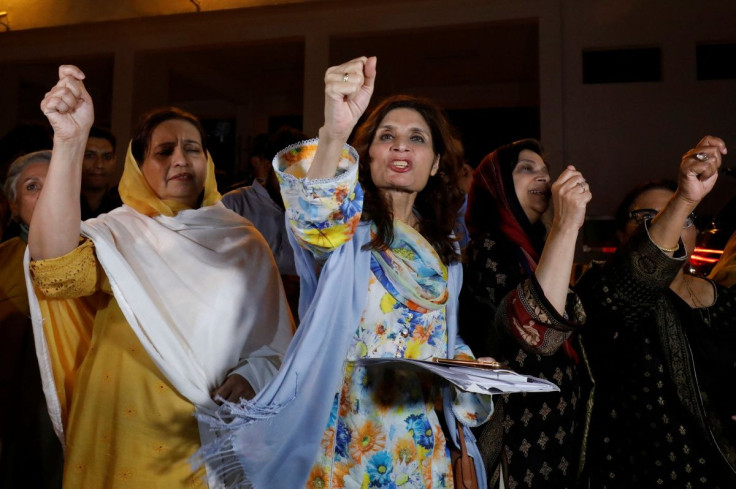 Supporters of former Pakistani Prime Minister Imran Khan chant slogans as they protest after he lost a confidence vote in the lower house of parliament, in Islamabad, Pakistan April 10, 2022. 