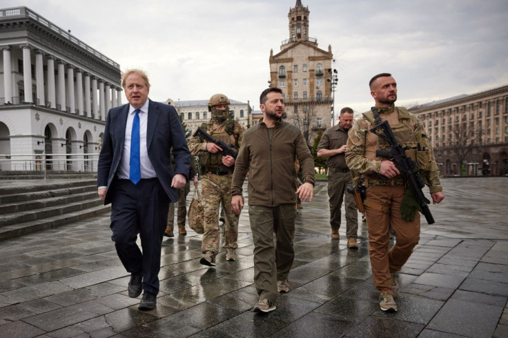 Ukraine's President Volodymyr Zelenskiy and British Prime Minister Boris Johnson walk at the Independence Square after a meeting, as Russia?s attack on Ukraine continues, in Kyiv, Ukraine April 9, 2022. Ukrainian Presidential Press Service/Handout via REU