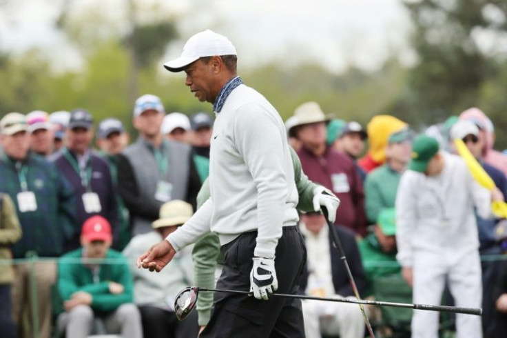 Tough day: Tiger Woods walks to the eighth tee on the way to a third-round 78 at the Masters