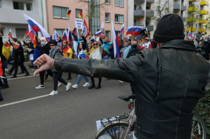 Around 600 people descended on financial hub Frankfurt on SundayÂ amid a sea of Russian flags