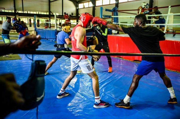 Olympic champion Andy Cruz (R) is excited about now being able to test himself against 'the best boxers in the world'