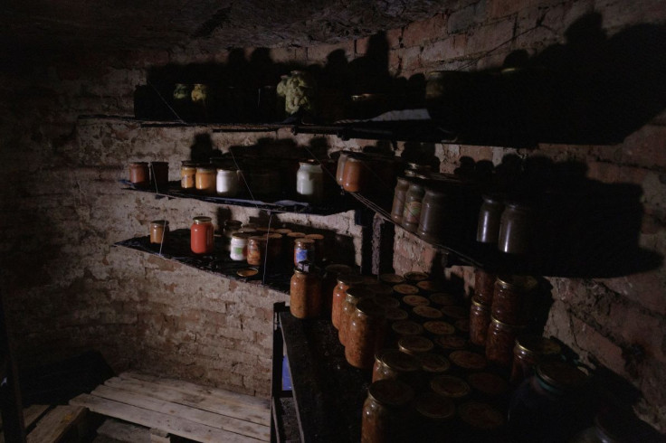 Jars of preserved food are seen in the six-square-metre storage cellar below the kitchen where the Bonderenko family hid for the night during an aerial bombardment in the village of Yakovlivka outside Kharkiv, as Russia's attack on Ukraine continues, Apri