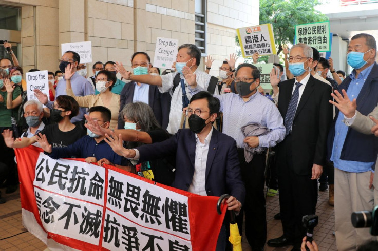 Pro-democracy activists chant slogans outside the West Kowloon Magistrates Court, in Hong Kong, China May 18, 2020.