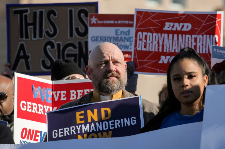 Demonstrators protest during a Fair Maps rally outside the U.S. Supreme Court, in Washington, U.S., March 26, 2019.