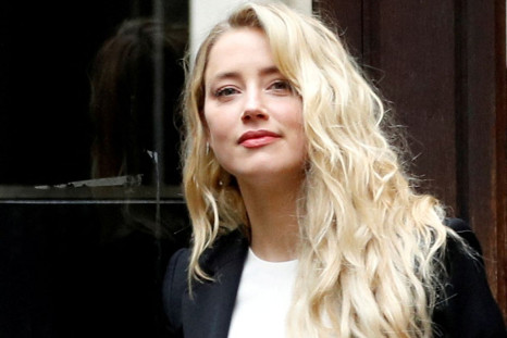 Actor Amber Heard arrives at the High Court in London, Britain July 27, 2020. 