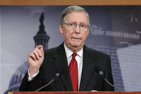 Senate Minority Leader Mitch McConnell (R-KY) makes a point about his meeting with President Barack Obama regarding the country's debt ceiling, during a news conference at the Capitol in Washington May 12, 2011.