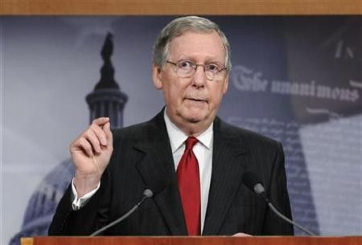 Senate Minority Leader Mitch McConnell (R-KY) makes a point about his meeting with President Barack Obama regarding the country's debt ceiling, during a news conference at the Capitol in Washington May 12, 2011.