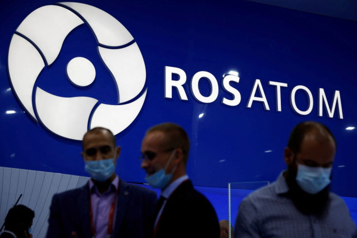 Participants are seen at the stand of Russian state nuclear agency Rosatom during the International military-technical forum "Army-2021" at Patriot Congress and Exhibition Centre in Moscow Region, Russia August 23, 2021.