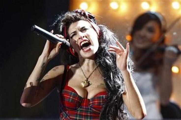 British singer Amy Winehouse performs at the Brit Awards at Earls Court in London in this February 20, 2008 file photo.