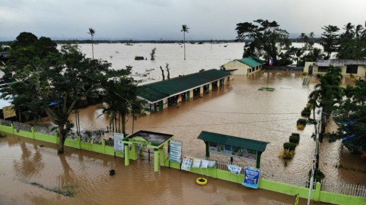 At least 24 people have been killed in landslides and flooding across central and southern Philippines, authorities said Monday