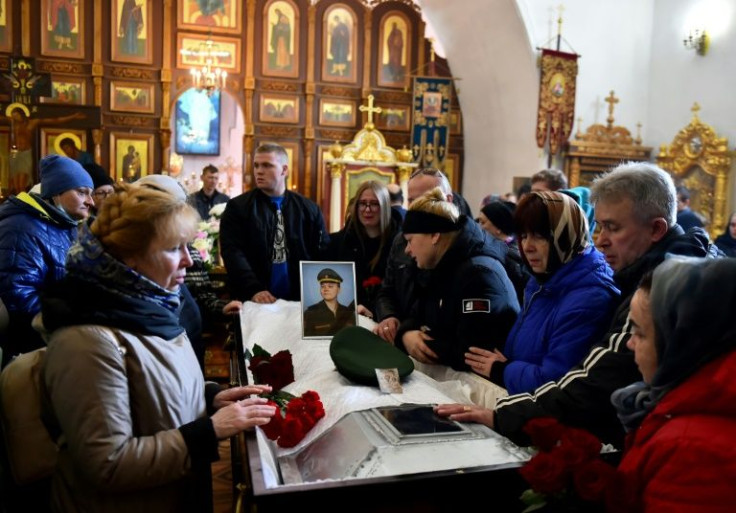 Mourners gather round Avrov's coffin -- former classmates dub his death in combat a "heroic deed"