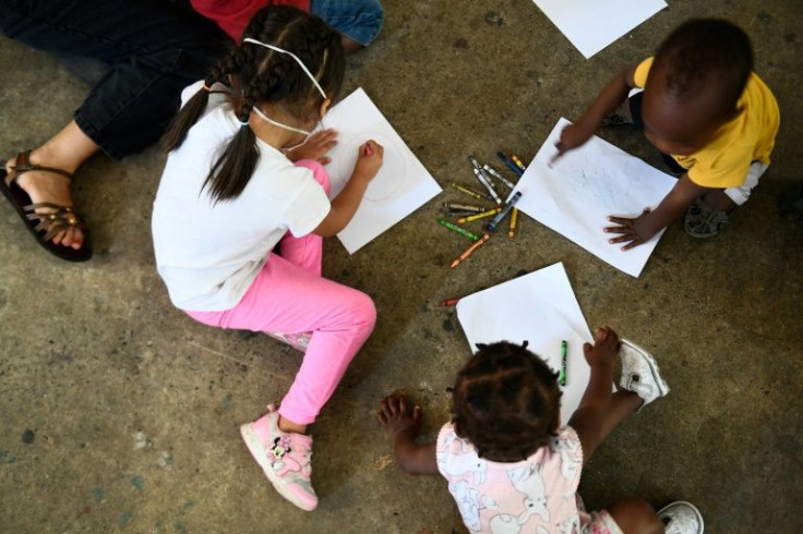 Young Haitian, Mexican and Central American children at the Movimiento Juventud 2000 shelter in Tijuana, Mexico do not have any dedicated space and few toys and materials