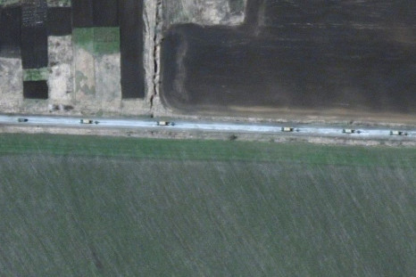 A satellite image shows trucks with towed artillery at the northern end of a military convoy moving south through the Ukrainian town of Velykyi Burluk, in Ukraine, April 8, 2022. Satellite image 2022 Maxar Technologies/Handout via REUTERS