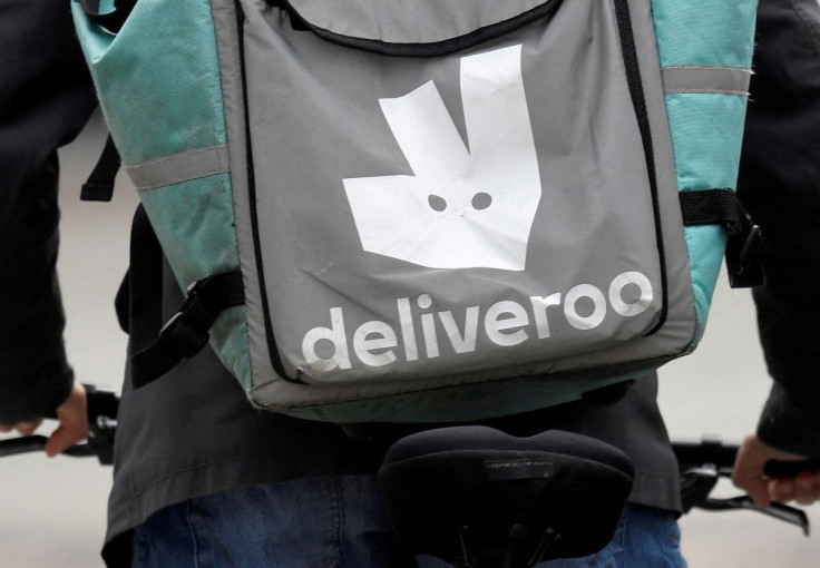A Deliveroo delivery rider cycles in London, Britain, March 31, 2021. 