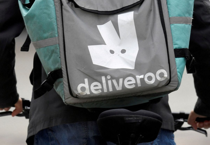 A Deliveroo delivery rider cycles in London, Britain, March 31, 2021.