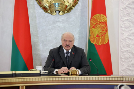 Belarusian President Alexander Lukashenko chairs a meeting with members of the Security Council in Minsk, Belarus April 7, 2022. Sergei Sheleg/BelTA/Handout via REUTERS 