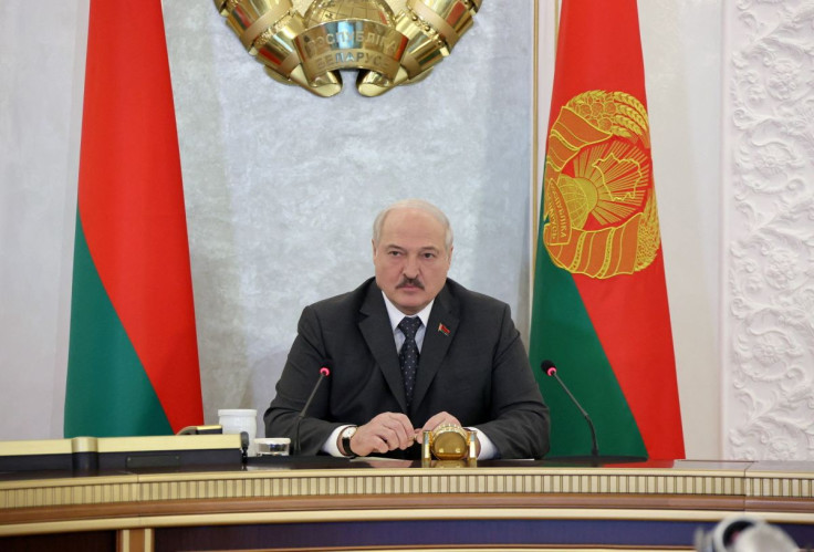 Belarusian President Alexander Lukashenko chairs a meeting with members of the Security Council in Minsk, Belarus April 7, 2022. Sergei Sheleg/BelTA/Handout via REUTERS 