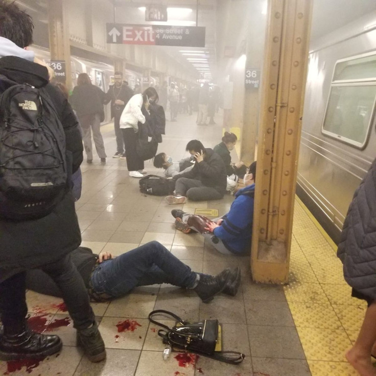  SENSITIVE MATERIAL. THIS IMAGE MAY OFFEND OR DISTURB    Wounded people lie at the 36th Street subway station, in New York City, April 12, 2022. Armen Armenian/via REUTERS   
