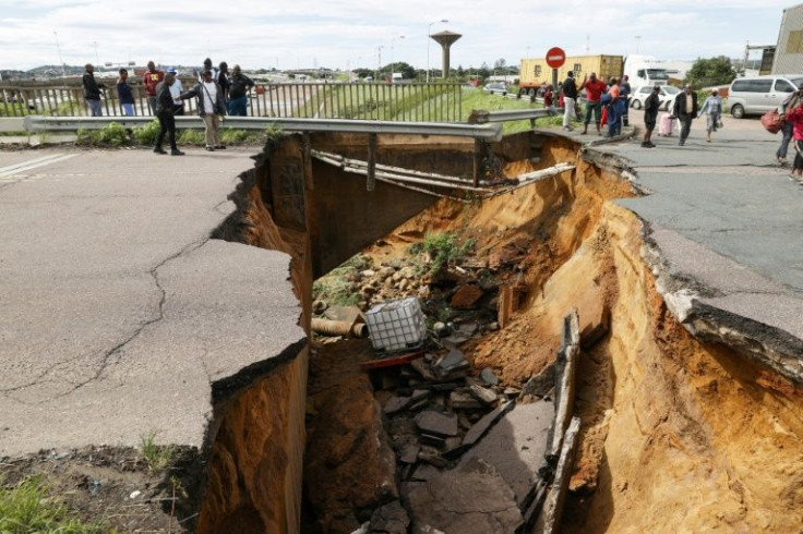 A huge crack opened up in this road after its foundations were washed away