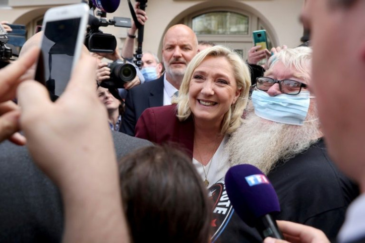 Marine Le Pen posed with supporters after a press conference in Vernon, Normandy.