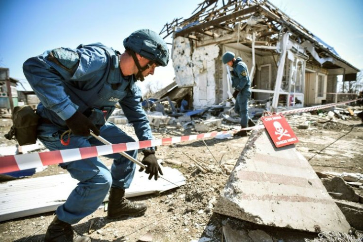 Shelling has destroyed houses, shops and cafes after fierce fighting for the town