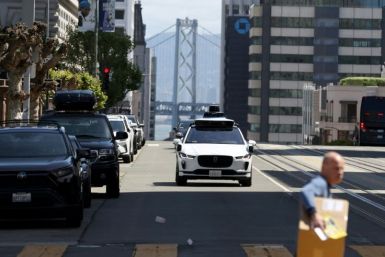 A self-driving car owned by Waymo driving in San Francisco in April 2022