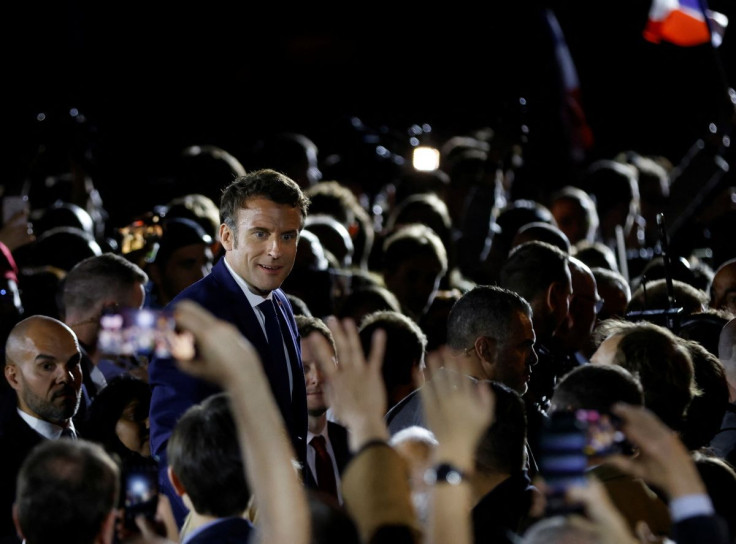 French President Emmanuel Macron, candidate for re-election in the 2022 French presidential election, attends a campaign meeting at the Place du Chateau near the Cathedral in Strasbourg, France April 12, 2022.