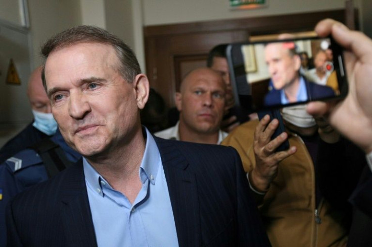 Medvedchuk was regularly photographed with Putin at lavish events