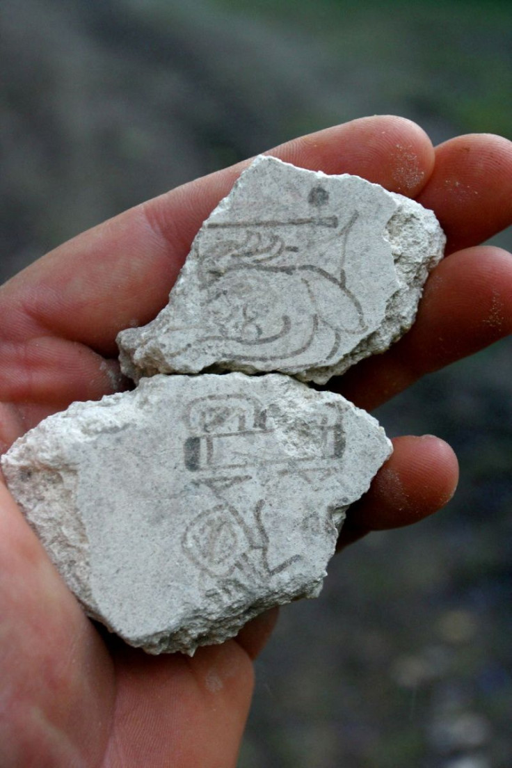 Two mural fragments dating to about 200 BC to 300 BC from the San Bartolo Preclassic ancient Maya site in Guatemala bearing evidence for the earliest use of the Maya calendar, a symbol for the calendar date "7 Deer" (top) and as well as a partial hierogly