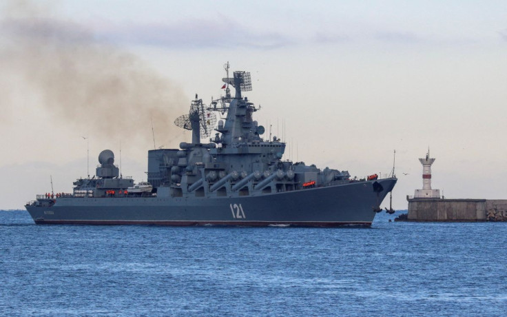 The Russian Navy's guided missile cruiser Moskva sails back into a harbour after tracking NATO warships in the Black Sea, in the port of Sevastopol, Crimea November 16, 2021. 