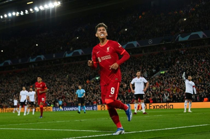Liverpool's Roberto Firmino celebrates after scoring against Benfica