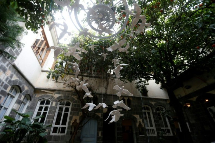 Buthaina al-Ali crafted the lifelike doves and told students to "hang them in a way they see fit"