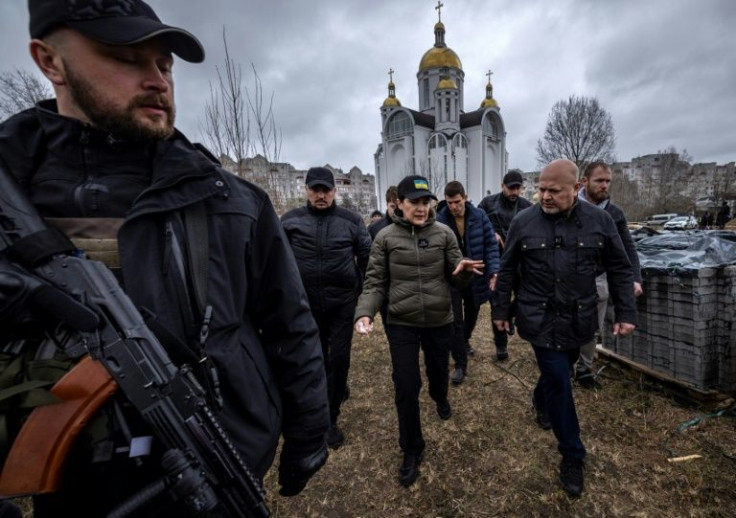 A visit by the International Criminal Court's chief prosecutor to Bucha came as the new front of the war shifts eastward