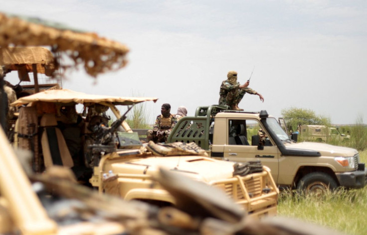 Malian soldiers are pictured during a patrol with soldiers from the new Takuba force near Niger border in Dansongo Circle, Mali August 23, 2021.