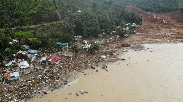 An aerial view shows  houses destroyed by a landslide that slammed into the village of Pilar in Abuyog town, Leyte province