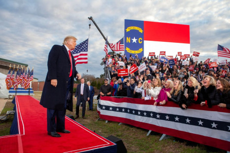 Former U.S. President Donald Trump greets the crowd during a rally he hosted in Selma, North Carolina, U.S., April 9, 2022. 