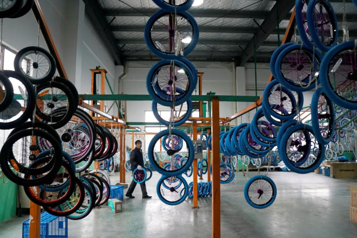 An employee works on the production line of Kent bicycles at Shanghai General Sports Co., Ltd, in Kunshan, Jiangsu Province, China, February 22, 2019. 