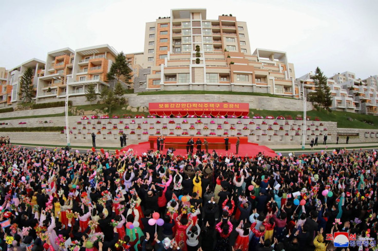 North Korean leader Kim Jong Un attends a tape-cutting ceremony to mark the completion of a terraced residential district on a bank of the Pothong River in Pyongyang, North Korea, April 13, 2022. KCNA via REUTERS