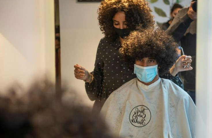 Curly heads now feature in TV shows, movies and the billboards that line Cairo's highways