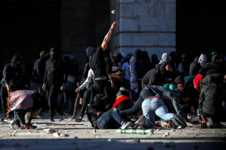 Palestinian demonstrators clash with Israeli police at Jerusalem's Al-Aqsa mosque compound