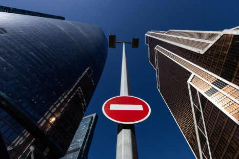 A stop road sign is seen next to skyscrapers at Moscow International business centre, also known as "Moskva-City", in Moscow, Russia April 14, 2022. 
