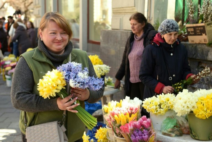 Beside buckets of daffodils, Myroslava Kumechko says 70 percent of her business before the war came from christenings, anniversaries and weddings