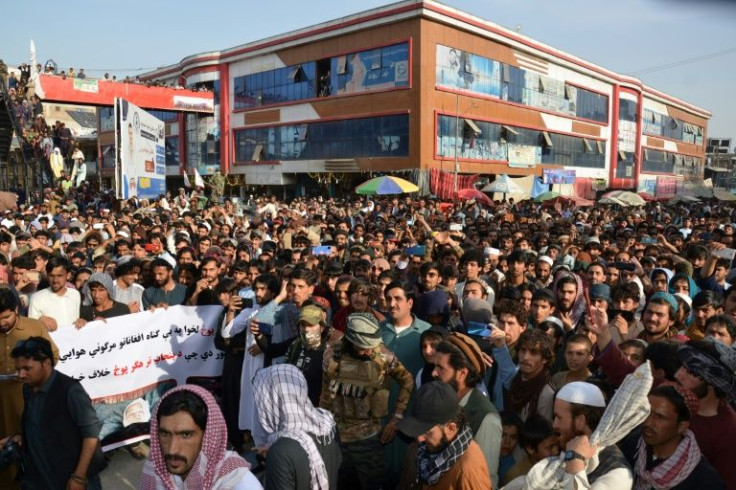 Demonstrators take part in a protest against Pakistani rocket attacks in Khost Province, in Khost on April 16, 2022.