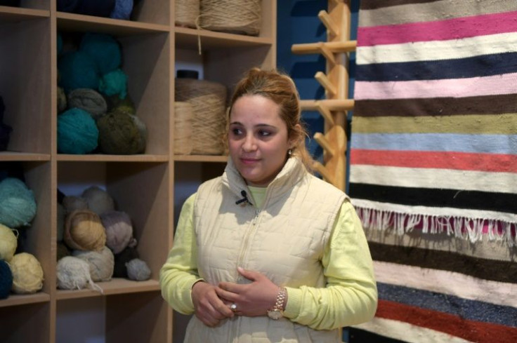 Fatima Alhamal, local coordinator for Shanti, whose staff use an eclectic array of old clothing from the flea market, giving them a new life as rugs