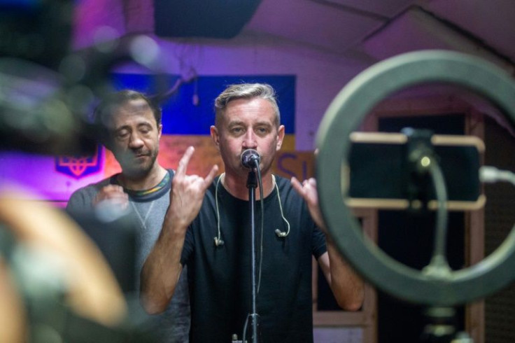 Entertainers like poet Serhiy Zhadan perform for Ukrainians sheltering underground in Kharkiv to distract them from the war raging above