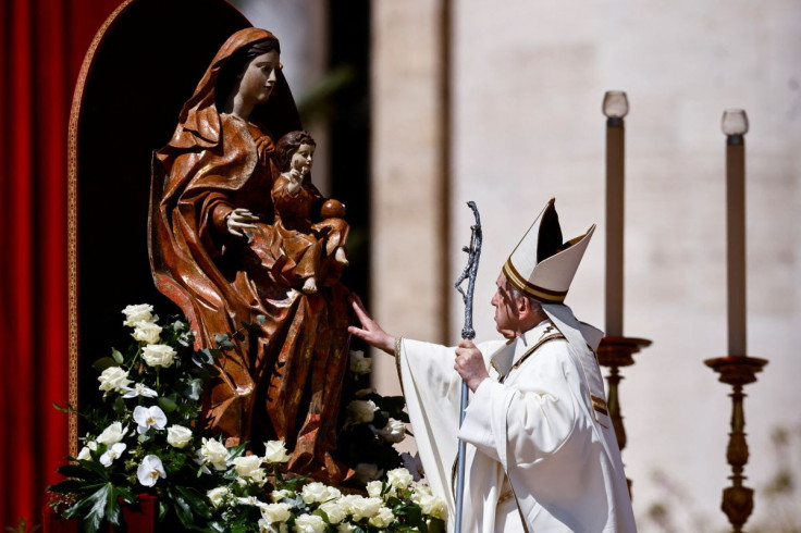 Pope Francis leads the Easter Mass at St. Peter's Square at the Vatican, April 17, 2022. 