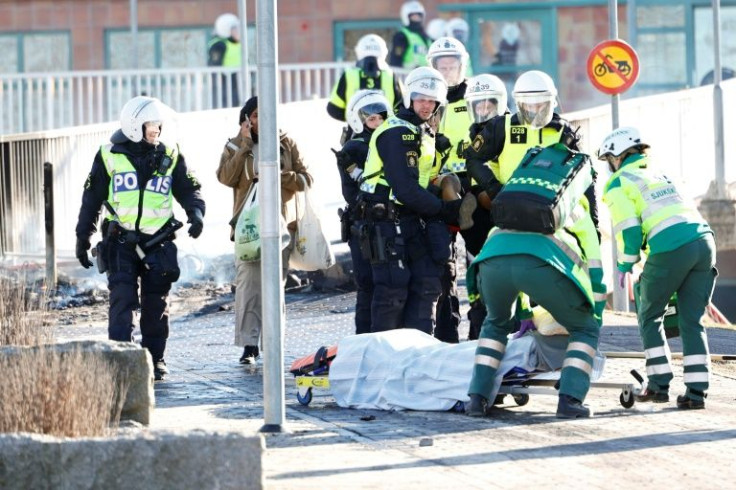 The clashes happened as people protested plans by a far-right group to publicly burn copies of the Koran