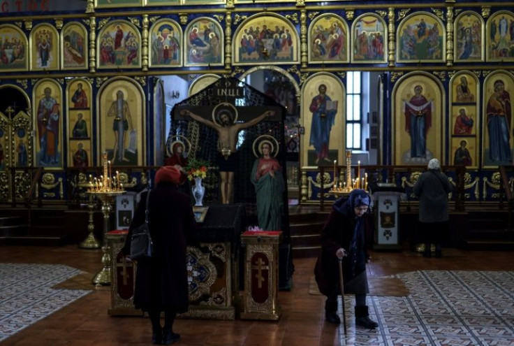 In the Orthodox Svyato-Pokrovsky church, around 40 people occupied the largely empty pews