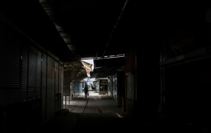 Most of the stalls in Kramatorsk's large central market are closed, but dozens of residents are still roaming the streets